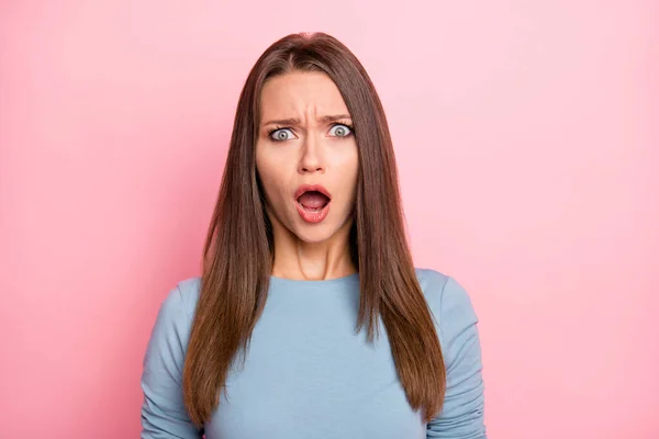 Photo of fearful mad grimacing girl afraid of news she heard emotional isolated over pastel color background — Stock Photo, Image