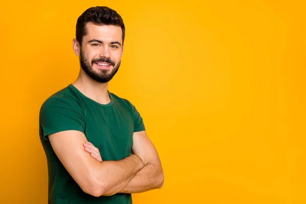 Turned photo of charming guy feel positive emotions have spring free time cross hands copyspace wear stylish clothing isolated over yellow color background — Stock Photo, Image