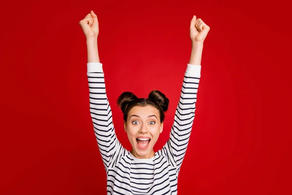 Portrait of amazed funky girl sport fan hear incredible win lottery win sales news scream wow omg raise fists wear good look white clothes isolated over bright color background — Stock Photo, Image