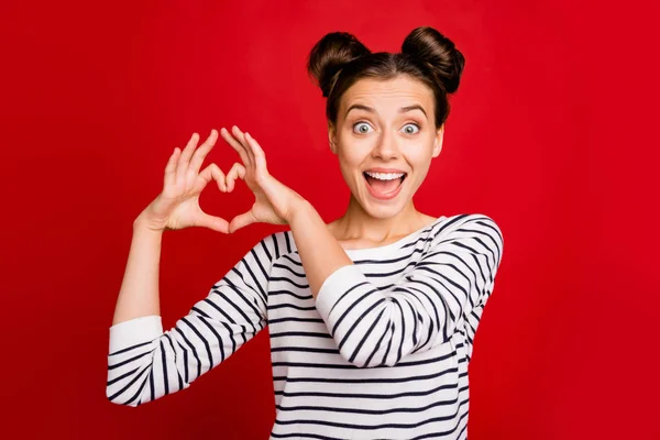 Portrait of impressed girl crazy girlfriend make fingers heart passionate love sign scream unbelievable unexpected wear white pullover isolated over red color background — ストック写真