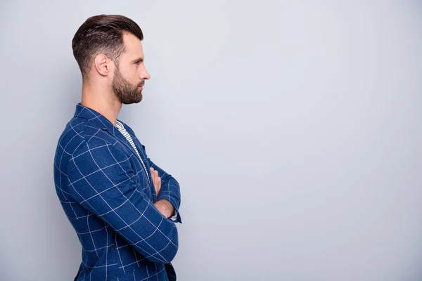 Profile side view portrait of his he nice serious attractive bearded guy wearing checked blazer folded arms modern cool haircut folded arms isolated over light grey pastel color background — Stock Photo, Image