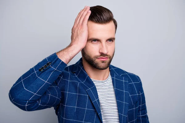 Close-up portrait of his he nice well-groomed serious attractive bearded guy in checked blazer touching fixing caressing haircut isolated over light grey pastel color background — Stock Photo, Image