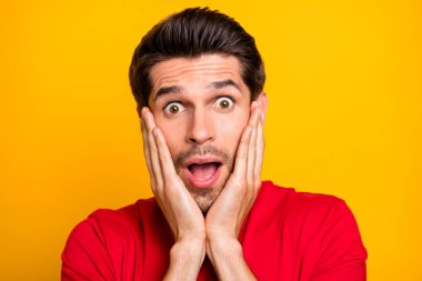 Close up photo of funky guy have made terrible mistake stare stupor scream omg palm touch cheeks feel impressed reaction wear good look outfit isolated over shine color background clipart