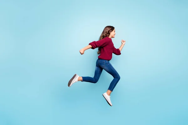 Full length body size view of her she nice attractive lovely cheerful cheery active wavy-haired girl jumping running fast isolated on bright vivid shine vibrant green turquoise color background — Stock Photo, Image