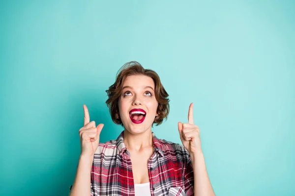 Close up photo of amazed excited girl point indicator finger up direct adverts promo recommend sales discount wear good looking clothes isolated over teal color background — Stock fotografie