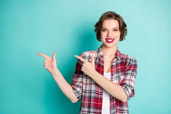 Portrait of positive cheerful girl point index finger copy space direct present promotor adverts wear stylish clothes isolated over turquoise color background — Stok Foto