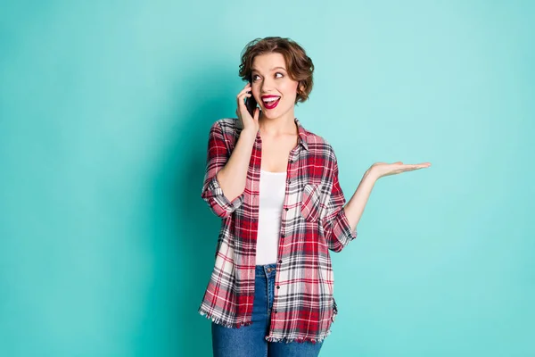 Portrait of candid girl speak with her best friends on smartphone enjoy weekend wear stylish trendy outfit isolated over teal color background — Stok fotoğraf