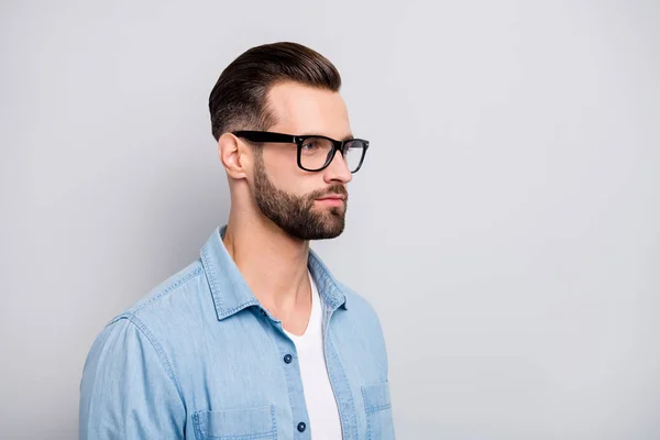 Closeup photo of amazing macho guy serious looking empty space young promoted boss chief wear specs casual denim outfit isolated grey color background — Stock Photo, Image