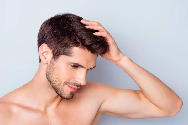 Close-up portrait of nice attractive stylish confident peaceful bearded brown-haired guy touching silky healthy shine hair anti alopecia effect isolated on light white grey color pastel background — Stock Photo, Image