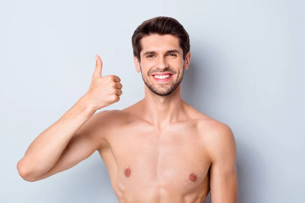 Close-up portrait of his he nice attractive bearded confident cheerful cheery glad brown-haired naked guy showing thumbup ad advert perfect skin isolated on light white grey color pastel background — Stock Photo, Image