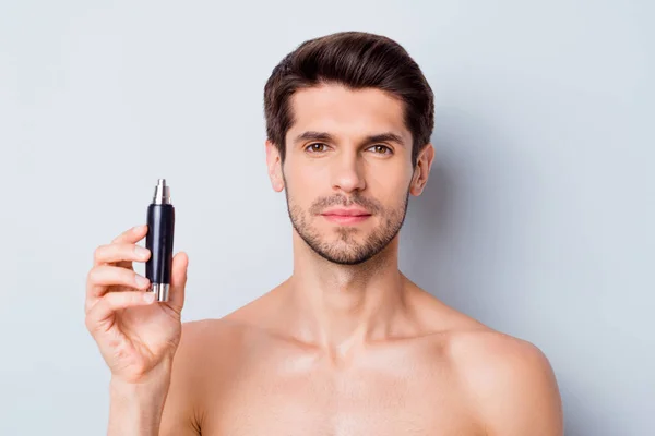 Close-up portrait of his he nice attractive bearded well-groomed brown-haired guy holding in hand hair cutter device advert ad isolated on light white grey color pastel background — Stock Photo, Image