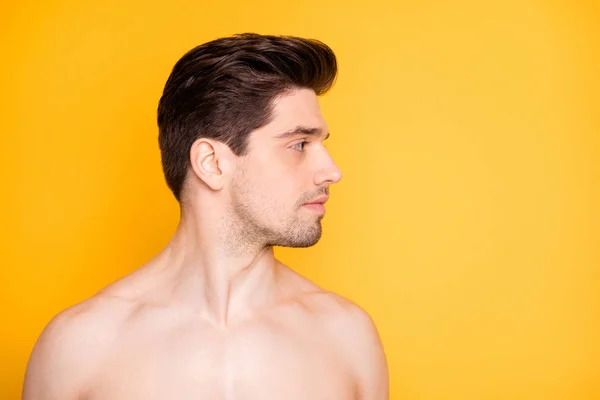 Close-up portrait of his he nice attractive handsome well-groomed pure naked nude guy looking aside daily facial care hydration isolated over bright vivid shine vibrant yellow color background — Stock Photo, Image