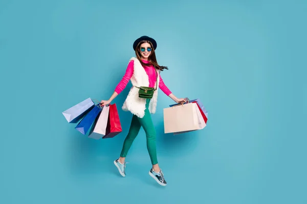 Full length body size view of her she nice attractive dreamy girlish cheerful cheery girl carrying buyings enjoying leisure isolated on bright vivid shine vibrant green blue turquoise color background — 스톡 사진