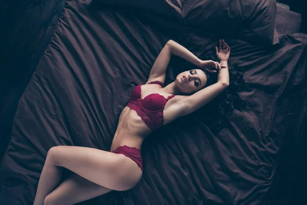 Close up top above high angle view photo beautiful tenderness she her lady wife perfect ideal shapes belly hips skin lying sheets eyes closed nude red bikini boudoir best lover room indoors bedroom — 스톡 사진