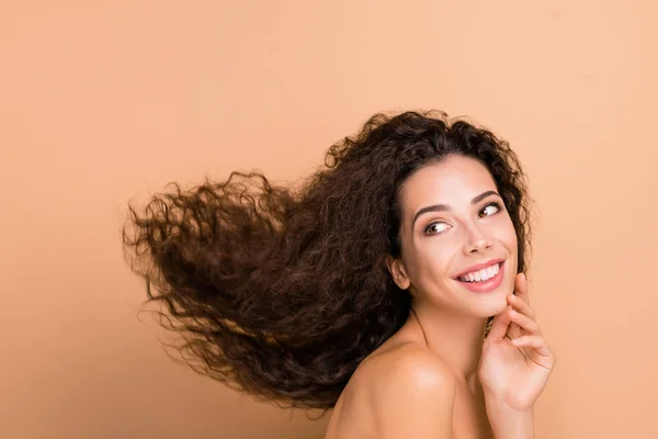 Close up side profile photo beautiful she her lady look empty space touch facial skin show great result use shampoo hair cure recovery long wave hairdo flight wear no clothes isolated beige background — Stock Photo, Image