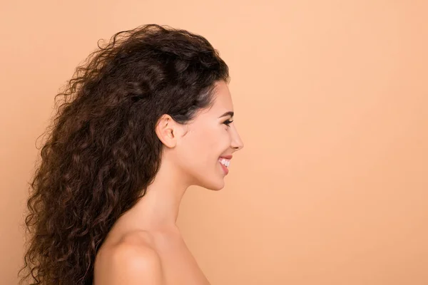 Close up side profile photo beautiful amazing she her model lady ideal appearance silky soft skin condition slim skinny look empty space wondered wear no clothes isolated bege pastel background — Fotografia de Stock