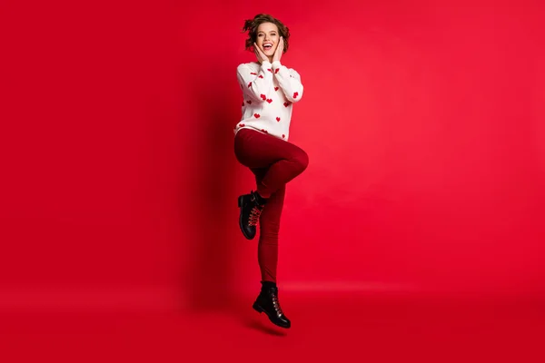 Full length body size view of her she nice attractive lovely charming girlish feminine modest cheerful cheery glad girl having fun jumping celebrating isolated on bright vivid shine vibrant red color — Stock Photo, Image