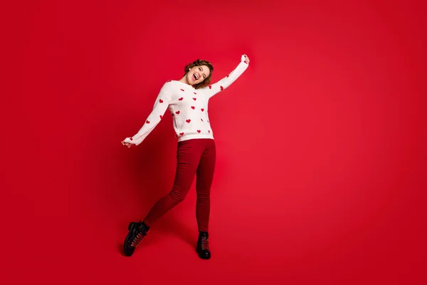 Full length body size view of her she nice attractive lovely overjoyed cheerful cheery glad girl celebrating having fun party time isolated on bright vivid shine vibrant red color background — 스톡 사진