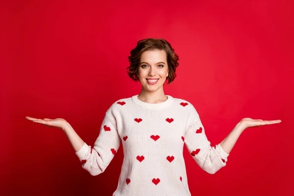 Portrait of her she nice attractive lovely content cheerful cheery girl holding on two palms copy space new novelty decision isolated over bright vivid shine vibrant red color background — Stock Photo, Image