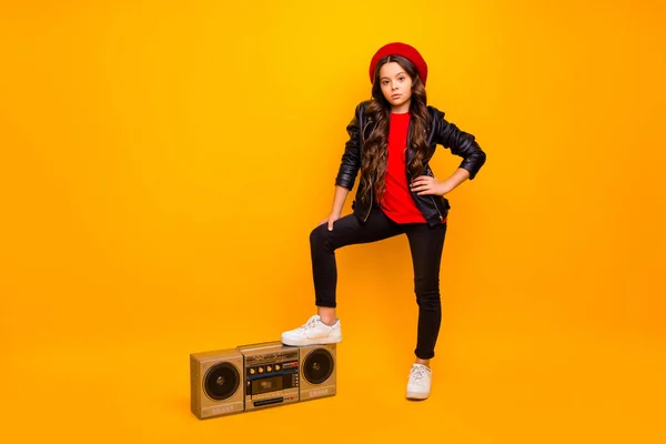 Full length body size view of nice attractive trendy long-haired girl in streetstyle holding leg on boombox pop rock heavy metal party isolated over bright vivid shine vibrant yellow color background — 스톡 사진