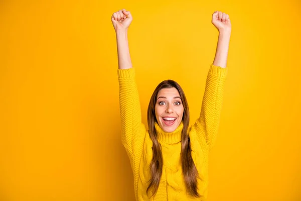 Portrait of cheerful girl hear her lottery win news impressed raise fists scream unbelievable wear soft warm knitted jumper isolated over bright color background — 스톡 사진