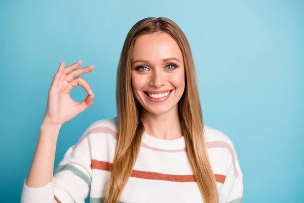 Photo of white cheerful positive pretty sweet woman smile toothy showing you ok sign expressing satisfaction on face about result isolated pastel color background — 스톡 사진