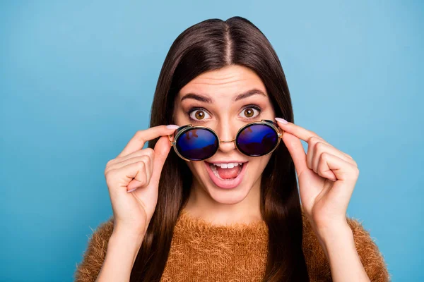 Close up photo of funky crazy girl touch her specs look see wonderful bargain scream unexpected unincredible wear spring style clothes isolated over blue color background — Stock fotografie