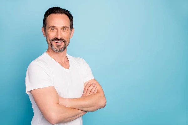 Profile side view portrait of his he nice attractive content healthy cheerful cheery guy experienced gym trainer isolated on bright vivid shine vibrant teal green blue turquoise color background — ストック写真