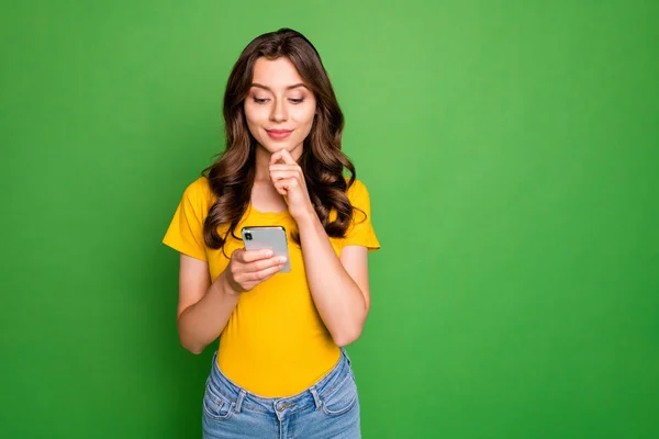 Portrait of her she nice attractive lovely charming cute winsome cheerful wavy-haired girl using 5g app web service creating post isolated on bright vivid shine vibrant green color background — 스톡 사진
