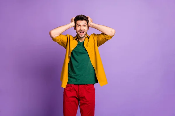 Wonderful summer bargain concept. Astonished funky crazy guy hear incredible novelty shout yell touch hands head wear modern youth outfit isolated over vivid color background — 스톡 사진