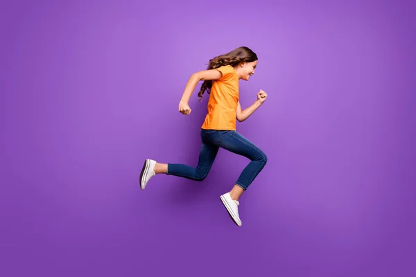 Full length body size view of her she nice attractive lovely funky cheerful cheery wavy-haired girl jumping running fast action isolated over lilac purple violet pastel color background — Stock Photo, Image