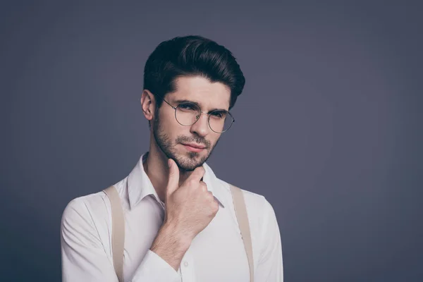 Close-up portrait of his he nice attractive smart clever intellectual focused brunette guy realestate agent broker thinking touching chin isolated over grey violet purple pastel color background — Stock Photo, Image