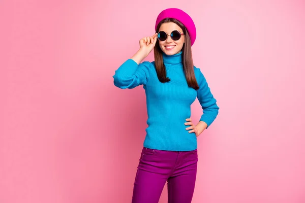 Portrait of her she nice-looking dreamy confident fashionable attractive lovely cheerful cheery girl touching specs enjoying weekend holiday isolated over pink pastel color background — ストック写真