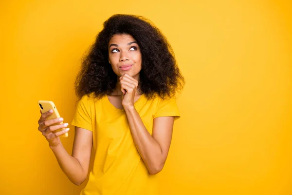 Close-up portrait of her she nice attractive lovely creative cheerful cheery wavy-haired girl using cell creating smm marketing isolated over bright vivid shine vibrant yellow color background — Stock Photo, Image