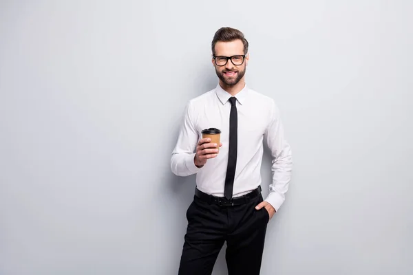 Portrait of positive handsome collar economist banker man rest after everyday start-up meeting hold latte papercard cup wear white black clothes isolated over grey color background — 스톡 사진