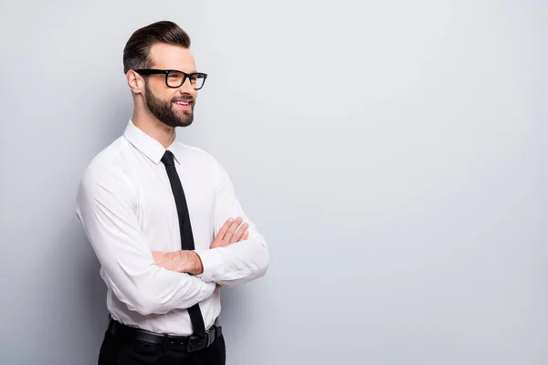 Photo of attractive young business man bossy crossed arms friendly smiling meet colleagues look empty space wear specs white office shirt black pants tie isolated grey color background — Stock Photo, Image