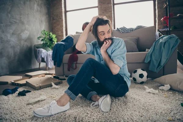 What had happened here. Photo of crazy guy holding head intoxicated food underwear floor had stag party suffer hangover morning headache chaos flat indoors — ストック写真