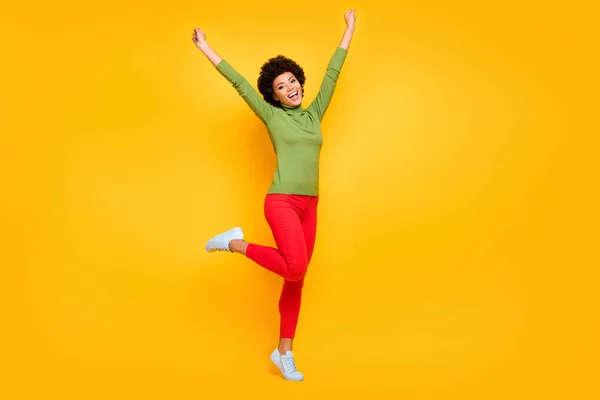Full length body size view of her she nice attractive lovely teenage cheerful wavy-haired girl celebrating having fun free time isolated over bright vivid shine vibrant yellow color background — 图库照片
