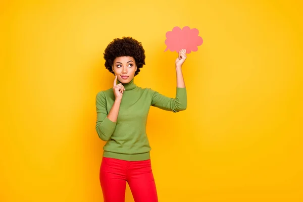 Photo of thinking pondering interested woman in red pants looking into pink cloud of thoughts thinking on new ideas isolated vibrant color background — 图库照片