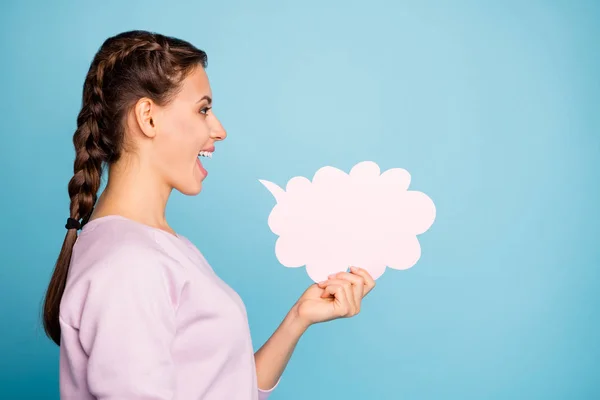 Close-up profile side view portrait of nice attractive lovely cheerful cheery girl holding in hand bubble saying isolated over bright vivid shine vibrant blue green teal turquoise color background — Stock Photo, Image