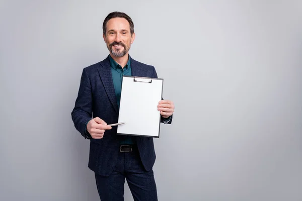 Photo of attractive business manager man showing contract clipboard for signing prepared pen agree deal formalwear blazer shirt pants blue suit isolated grey color background — Stock Photo, Image