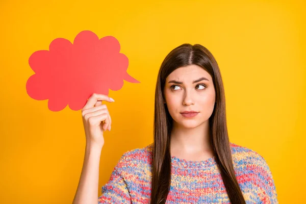 Close up photo of minded pensive girl hold red paper card think thoughts decide decisions choose choice try find solutions look feel nervous wear pullover isolated bright color background — Stock Photo, Image