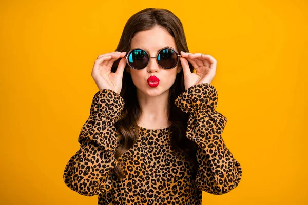 Close-up portrait of her she nice attractive lovely pretty glamorous wavy-haired girl touching specs sending air kiss isolated on bright vivid shine vibrant yellow color background — Stock Photo, Image