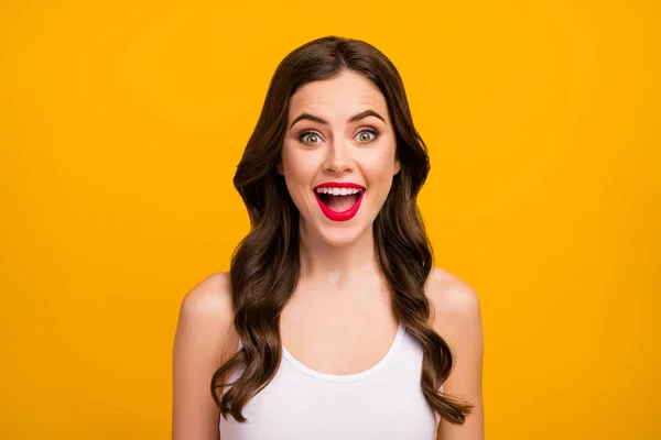 Closeup photo of beautiful pretty lady open mouth positive good mood long brunette hairdo surprised wear white tank-top isolated bright yellow color background — Stock Fotó