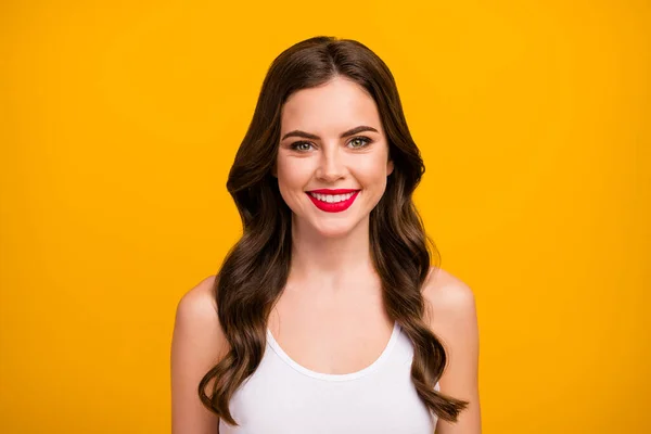 Closeup photo of beautiful pretty lady positive good mood easy-going person beaming smile long brunette hairstyle wear white tank-top isolated bright yellow color background — Stockfoto