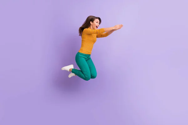 Full length body size view of nice attractive lovely cheerful cheery glad ecstatic girl jumping having fun fooling like diving isolated on violet purple lilac pastel color background — Stock Photo, Image