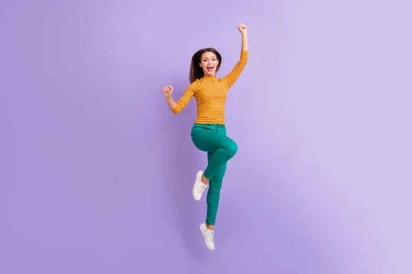 Full length body size view of nice attractive lovely cheerful cheery glad excited girl jumping having fun celebrating holiday vacation trip isolated on violet purple lilac pastel color background — 图库照片
