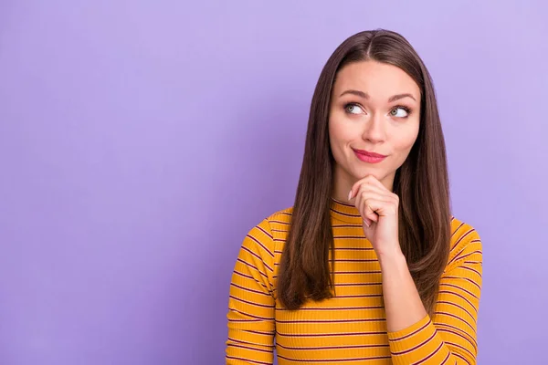 Portrait of inspired minded girl look copyspace touch hands chin think thoughts about future weekend plans wear stylish pullover isolated over violet color background — Stockfoto