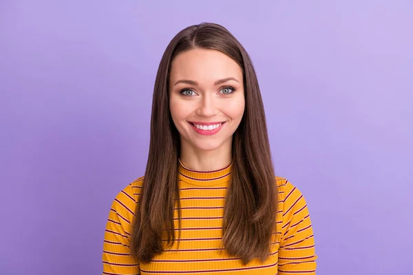 Portrait of sweet cute attractive girl look in camera smile toothy listen to her friends conversation wear stylish pullover isolated over violet color background — Stockfoto