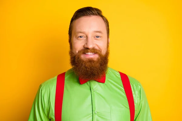 Closeup photo of excited happy red head guy toothy beaming smiling elegant look wear bright green shirt red suspenders bow tie isolated vivid color background — Stock Photo, Image